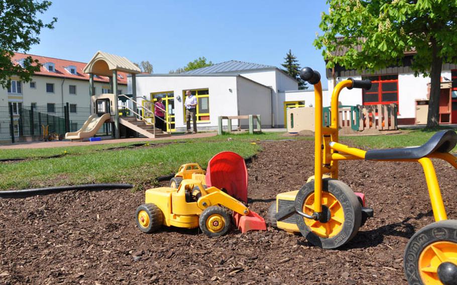 A tricycle and a toy truck sit outside the Schweinfurt (Germany) Child Development Center on Tuesday. U.S. Army Garrison Schweinfurt is investigating an allegation of inappropriate behavior at the center, according to an Army official.