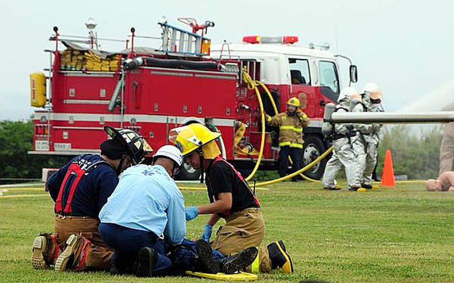 Japanese emergency responders tend to a simulated casualty during an annual bilateral training exercise between the U.S. military and Japanese Emergency Response Teams. The exercise involved approximately 120 Japanese and 60 U.S. service members.