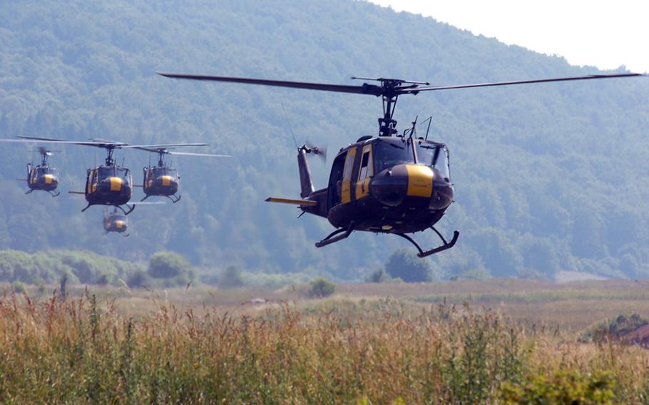 U.S. UH-1 helicopters prepare to drop German troops during air assault training at Hohenfels, Germany, in 2008. The "Huey" was retired from U.S. Army Europe service in a Wednesday ceremony at Hohenfels.