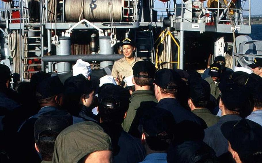 Retired Navy Cmdr. Darlene Iskra, shown addressing her crew aboard the USS Opportune days after becoming the first woman to command a commissioned vessel, said that many hurdles still exist when it comes to gender equality in the military.