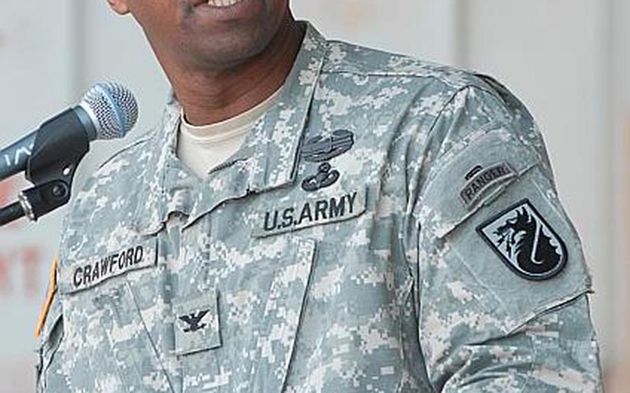 Col. Bruce T. Crawford took the reins of 5th Signal Command on Monday at Wiesbaden Army Airfield.