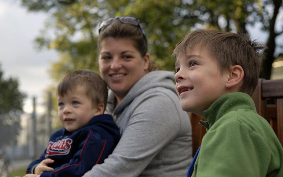 Jackson Melton, second-grader at Robinson Elementary/Middle School, waits outside for the first day of school to start on Aug. 29 with his mother, Brooke Melton, and his little brother, Tucker Melton, at Robinson Barracks in Stuttgart, Germany.