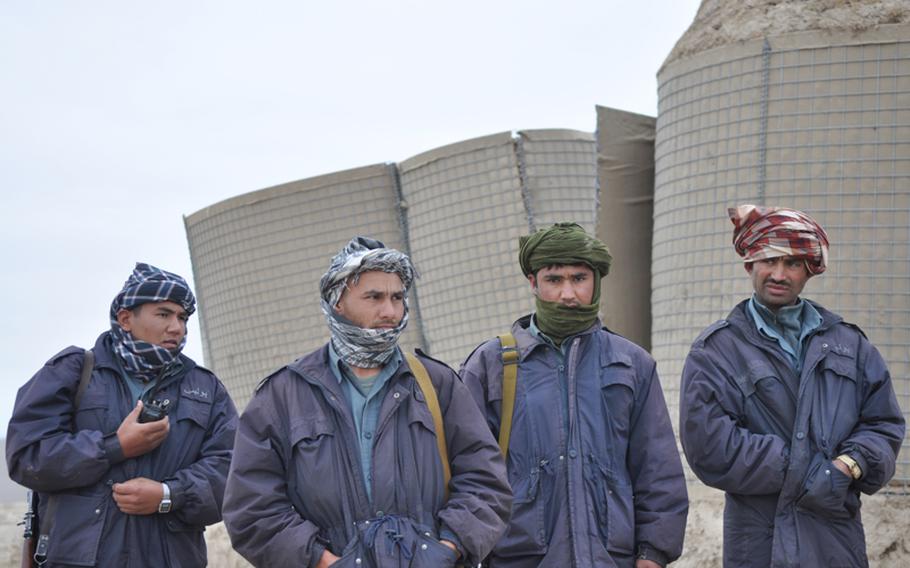 Afghan policemen, all of them Uzbeks, stationed on a hilltop outpost wait to hear if they will be allowed to join an American patrol into a Pashtun village near Gormach in western Faryab. Eventually their commanders refused to let them go with U.S. forces. "The biggest problem in Gormach is the tribes don&#39;t like each other," a policeman said. "Every tribe has its own Talibans."