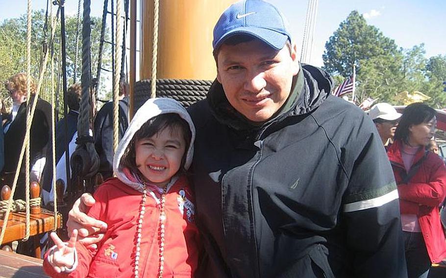 Moises Garcia and his daughter, Karina, then 6, are pictured in January 2008 at Walt Disney World in Orlando, Fla. The girl's mother, Emiko Inoue, pleaded no contest Nov. 21, 2011, to felony child custody interference by a parent for fleeing America with her daughter in 2008 rather than face a divorce and custody battle.