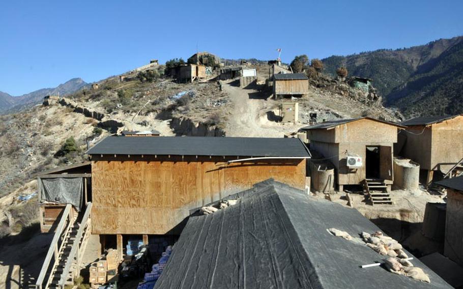 Afghan soldiers live in plywood huts at Observation Point Mace in northern Kunar province, two miles from the Pakistan border. The U.S. Army gave the outpost to Afghan forces last year as part of NATO&#39;s ongoing security transition.