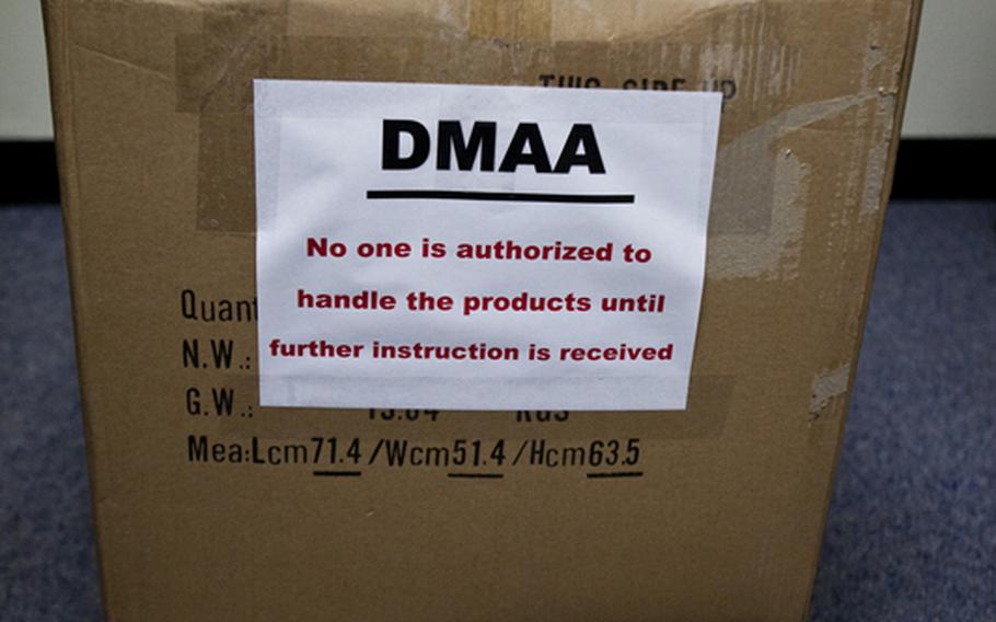 Bottles of dietary supplements containing dimethylamylamine, or DMAA, sit in boxes in the Yokota exchange store room. The Army and Air Force Exchange Service pulled the supplements from the shelves as the Defense Department investigates a possible link between DMAA and two soldiers&#39; deaths.