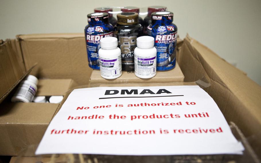 Bottles of dietary supplements containing dimethylamylamine, or DMAA, sit in boxes in the Yokota exchange store room. The Army and Air Force Exchange Service pulled the supplements from the shelves as the Defense Department investigates a possible link between DMAA and the death of two soldiers.