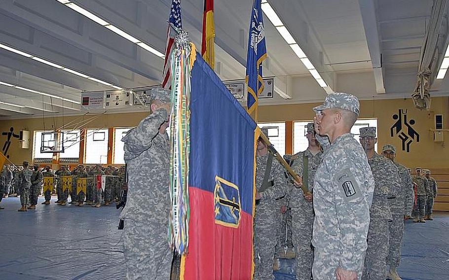 Col. Patrick Matlock, left, 170th Infantry Brigade Combat Team commander, and Command Sgt. Maj. Michael Anthony Grinston, the brigade's command sergeant major, preside over the uncasing of the unit's colors at a ceremony at Baumholder on Wednesday. The ceremony could mark the last time an infantry unit uncases its colors at Baumholder, as the 170th is scheduled to deactivate in October as part of larger military restructuring in the Defense Department.