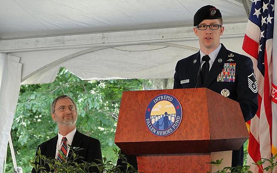 Air Force Master Sgt. Earl Covel, who sustained brain injuries over the course of 12 deployments, speaks at a groundbreaking ceremony for a National Intrepid Center for Excellence satellite facility at Fort Belvoir, Va. One of nine planned for bases across the country, the center will treat servicemembers dealing with traumatic brain injury and psychological health issues.