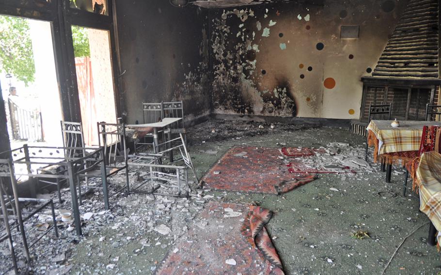 The interior of a restaurant destroyed during a 12-hour attack launched by militants late Thursday night at a lakeside resort on the outskirts of Kabul. Afghan security forces killed the five insurgents, who had killed 18 people during the siege.