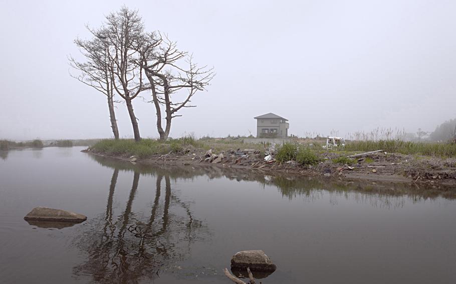 Many of the homes in Minamisoma, a town in Japan&#39;s Fukushima prefecture, were damaged beyond repair in the March 2011 tsunami, and their former occupants are still living in temporary housing 15 months later.