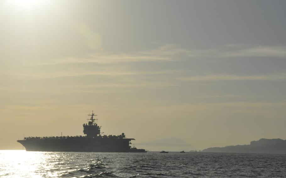 The USS Enterprise rests in the Gulf of Naples Friday during its final port stop before heading home to Virginia, where it is scheduled to be inactivated. The ship made its first port stop in 1962 in Naples.