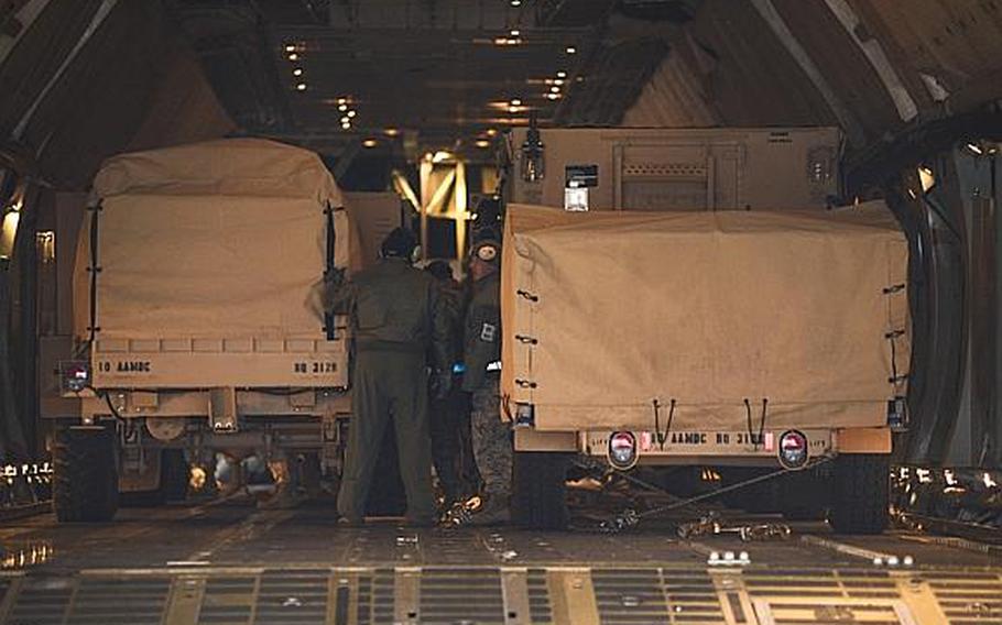 Equipment belonging to the Kaiserslautern-based 10th Army Air and Missile Defense Command is loaded onto a C-5 Galaxy at Ramstein Air Base, Germany, on Tuesday, Jan. 8, 2013.