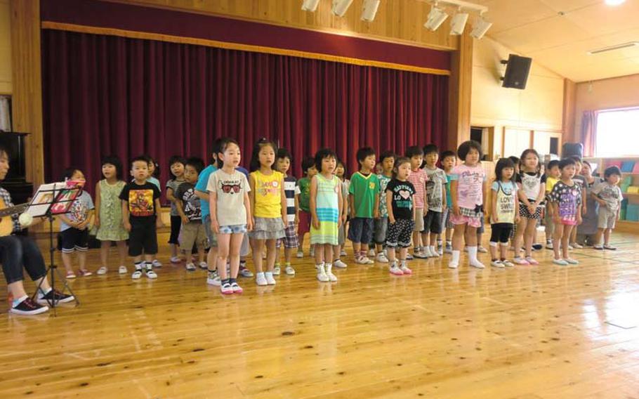 A group of 5-year-old children perform for Helping Hands for Tohoku, an aid group of U.S. military spouses, in Minamisoma in August  2012. The children, who live as little as 20 miles from the Fukushima Dai-ichi Nuclear Power Plant, are allowed to play outside for no more than 30 minutes.
