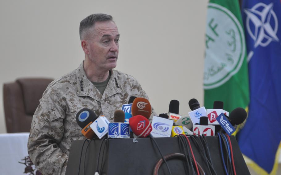 Gen. Joseph Dunford, commander of coalition forces in Afghanistan, speaks at a ceremony Monday marking the handover of Parwan Prison from U.S. to Afghan control. Delays in the handover have raised tensions between Washington and Kabul.