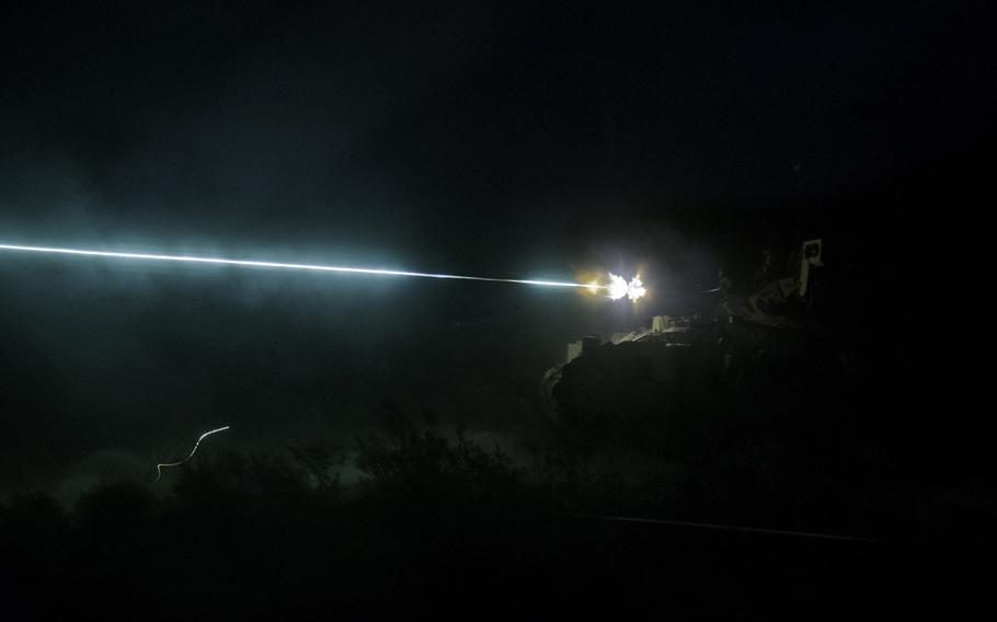 A U.S. Army M3A3 Bradley Fighting Vehicle from the 3rd Squadron, 1st U.S. Cavalry Regiment, Fort Benning, Ga., practices night-firing during National Training Center iteration 12-05, Fort Irwin, Calif., March 10, 2012.