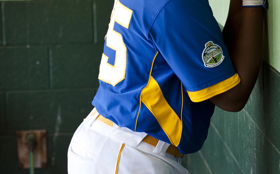 Tyler Woodberry rests his head against the wall in frustration at the end of his second game of the 2012 Little League World Series on Aug. 18, in Williamsport, Pa. Europe lost its second game of to tournament to Caribbean 14-1, ending their chance to compete for the 2012 LLWS championship.