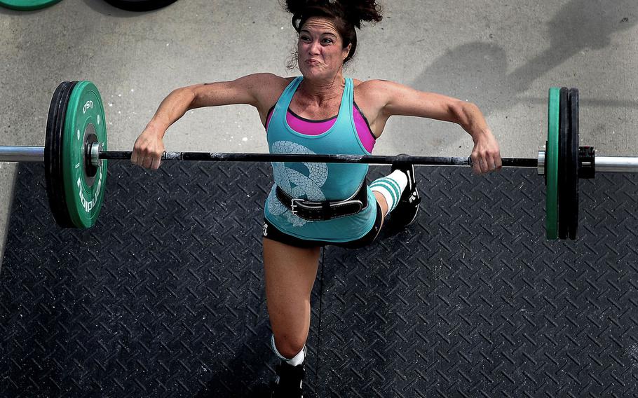 A competitor stresses during CrossFit Integrity,  the Integrity's Revenge Battle of Charleston CrossFit games October 6, 2012 in Charleston, S.C. CrossFit is growing in popularity every day as even the U.S. Military has integrated it into their physical fitness regime.