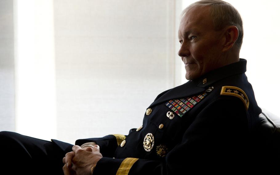 Gen. Martin E. Dempsey, Chairman of the Joint Chiefs of Staff, speaks with friends before a military retirement ceremony in West Point, N.Y., on Nov. 3, 2012.