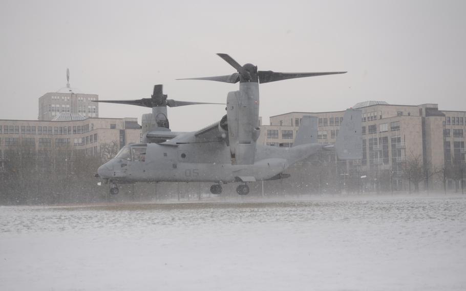 MV-22B Osprey, assigned to the 26th Marine Expeditionary Unit out of Camp Lejeune, kicks up snow as it lands in a field on Africa Command's Kelley Barracks. The aircraft is in Stuttgart for a four-day visit focused on showcasing the Ospreys' capabilities to senior leaders at U.S. European and Africa Command.
