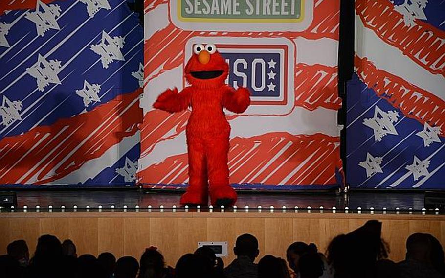 Elmo greets an audience full of children, parents and servicemembers during a "Sesame Street" show at Aviano Air Base, Italy, on Friday, July 5, 2013. "Sesame Street," in conjunction with the United Service Organizations, is traveling across the Pacific and Europe during the summer.

Jason Duhr/Stars and Stripes