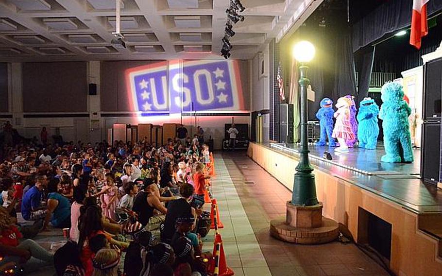 Characters from "Sesame Street" entertain the audience during during a show Friday, July 5, 2013 at Aviano Air Base, Italy. "Sesame Street," in conjunction with the United Service Organizations, is traveling across the Pacific and Europe during the summer.

Jason Duhr/Stars and Stripes