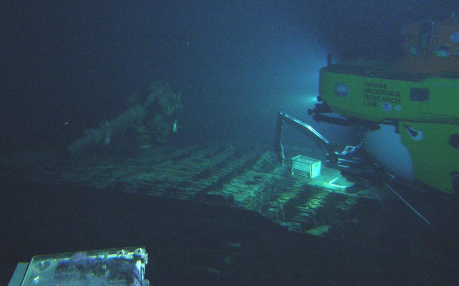 The I-400's deck gun comes into view of the Pisces V submersible in August 2013 off the coast of Oahu.