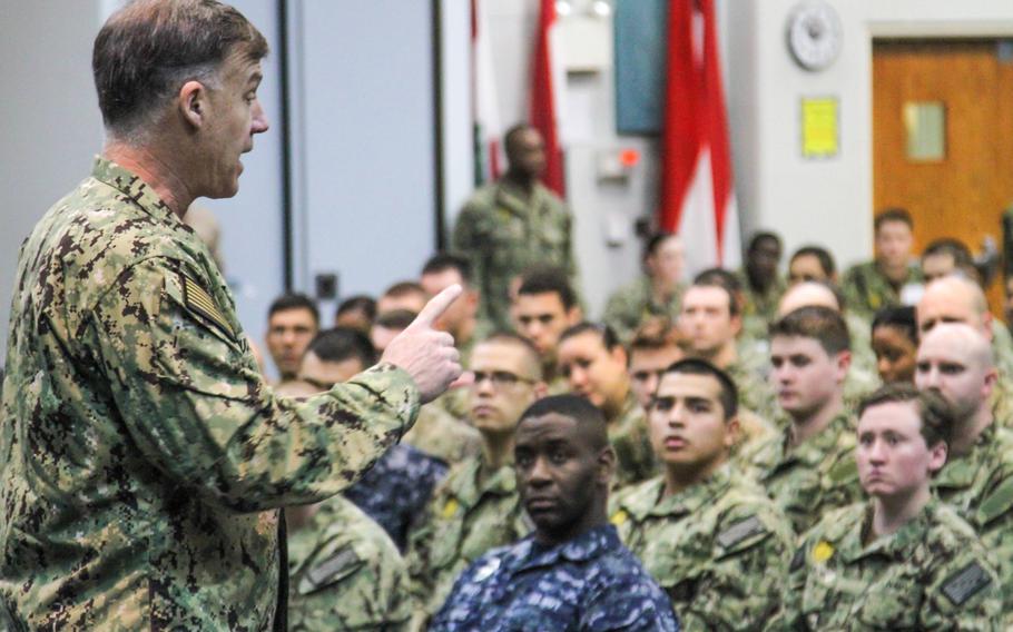 Rear Adm. Sean Buck, the director of the 21st Century Sailor office, addresses a group of  E-6 and below sailors at an all-hands call on Naval Support Activity Bahrain, Feb. 6 2014. Buck is on a six-month worldwide tour to promote the office, whose purpose is to help sailors in handling a wide variety of challenges.