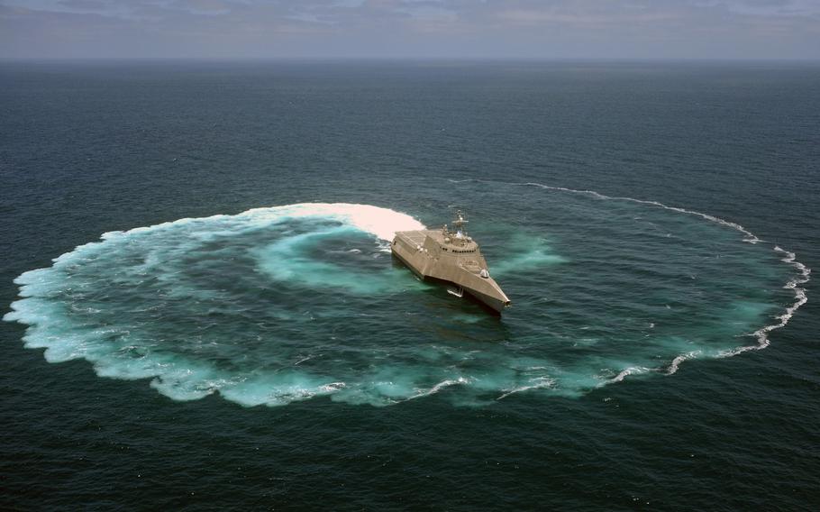 The littoral combat ship USS Independence demonstrates its maneuvering capabilities in the Pacific Ocean off the coast of San Diego in July. Some within the Pentagon are calling for the Navy's order of the ship to be dramatically reduced, raising questions about what the future surface fleet will look like.