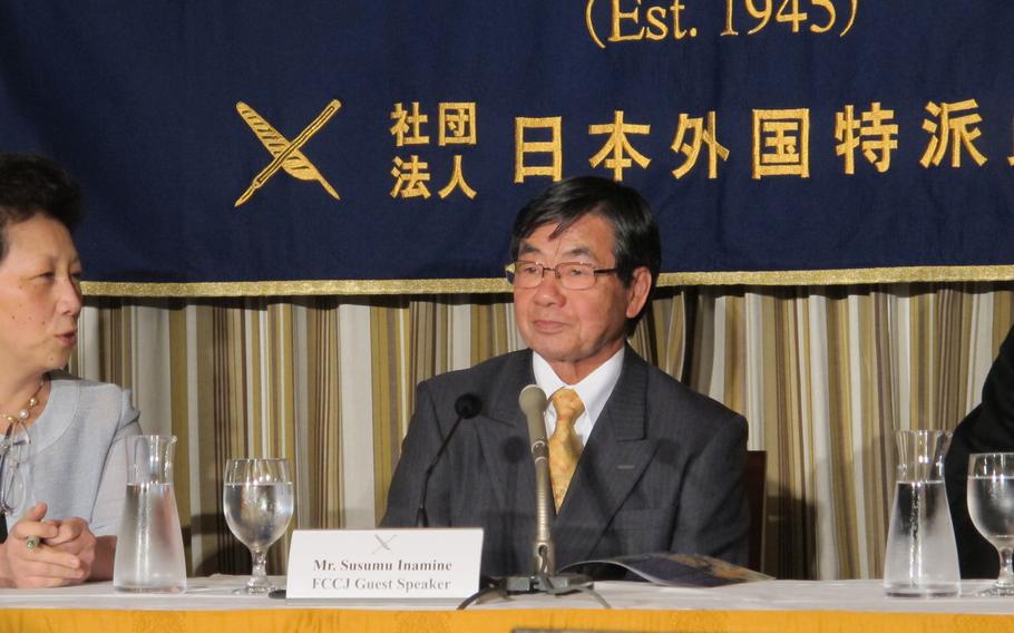 Nago Mayor Susumu Inamine talks with reporters in Tokyo on Feb. 13, 2014. Inamine, who is steadfastly opposed to building a replacement facility for Marine Corps Air Station Futenma in his city, won re-election in January despite opposition from Japan's ruling party. Inamine's opposition could complicate efforts by both the United States and Japan to move the controversial helicopter base.