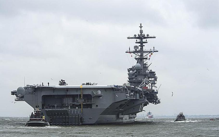 The aircraft carrier USS George H.W. Bush  departs Naval Station Norfolk for its scheduled deployment. 