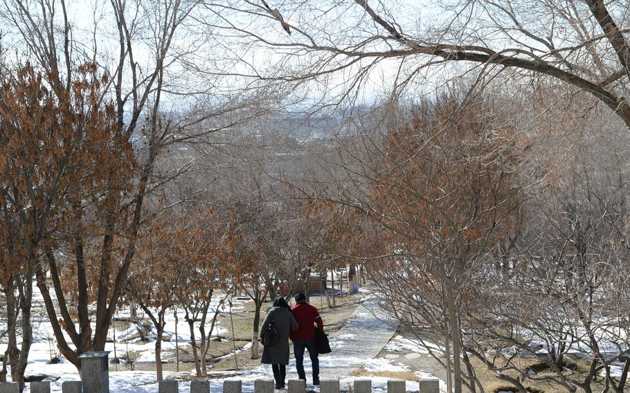 2:25 p.m. A couple take a walk through Babur Gardens, an ancient site in southeastern Kabul that erupts in color in the spring. In deeply conservative Afghanistan, the gardens is a popular place for couples to meet far from the gaze of their families. 
