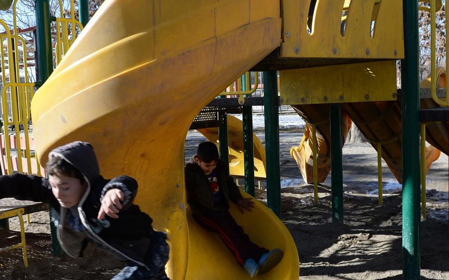 2:56 p.m. Children at a playground in the Deh Bori neighborhood, in western Kabul. 