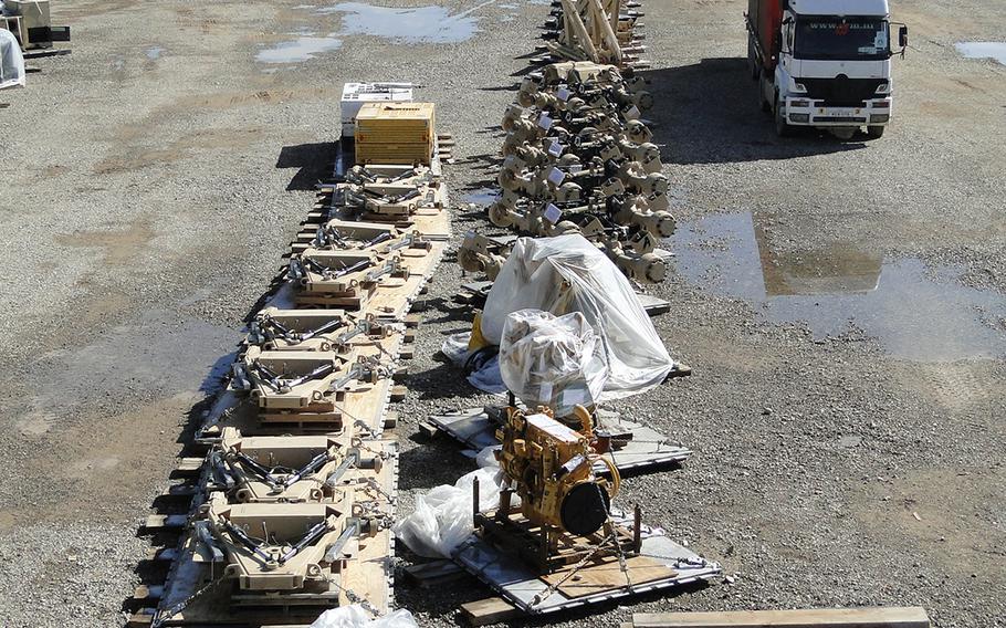 Gear collected from units leaving Afghanistan is staged on a Redeployment and Retrograde in Support of Reset and Reconstitution Operations Group lot at Camp Leatherneck in preparation for transport back to the United States.