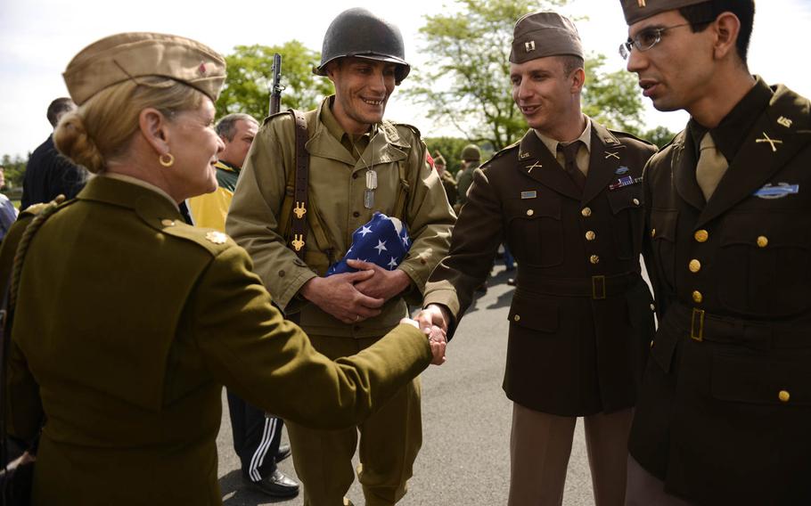 French members of World War II reenactment associations attend the Memorial Day ceremony at Lorraine American Cemetery Sunday, May 25, 2014, at St. Avold, France.