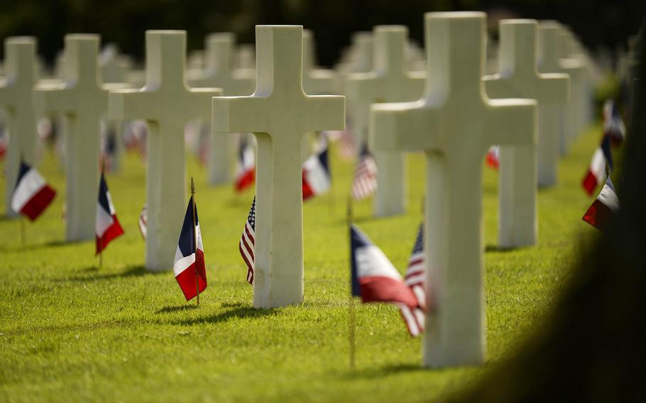 American and French flags decorate the more than 10,000 graves at Lorraine American Cemetery for the Memorial Day ceremony Sunday, May 25, 2014, at St.-Avold, France.