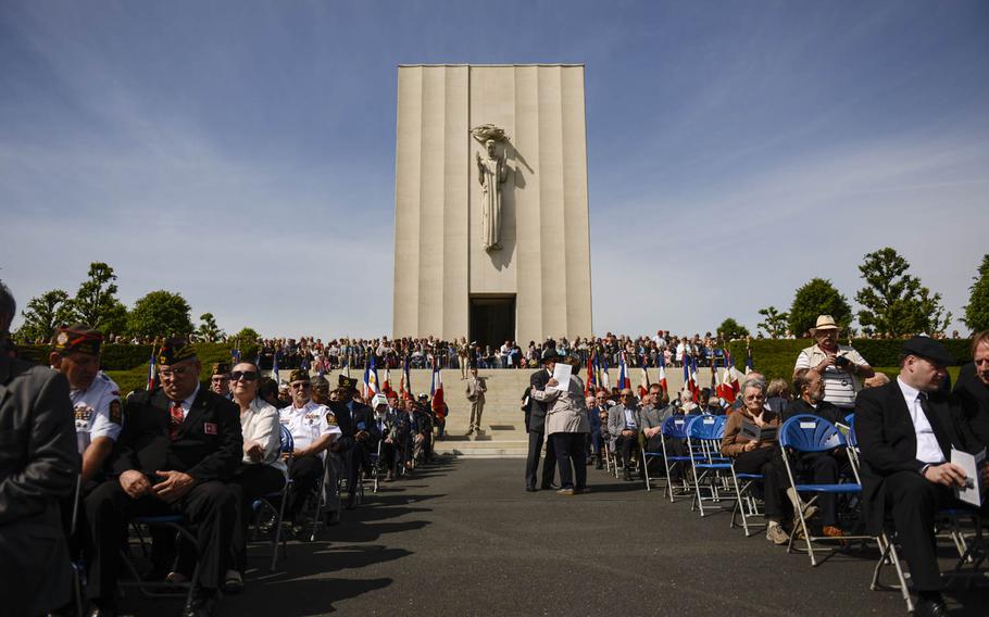 Observers watch the Memorial Day ceremony at Lorraine American Cemetery Sunday, May 25, 2014, at St.-Avold, France.