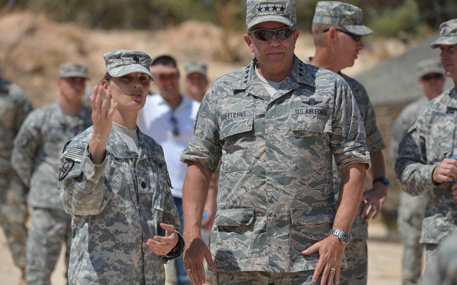 Lt. Col. Lisa Bartel, commander of 5th Battalion, 7th Air Defense Artillery Regiment, shows Gen. Philip Breedlove, supreme allied commander Europe, a Patriot missile battery during his visit to the Turkish army base in Gaziantep, where the unit is deployed, Thursday, July 31, 2014.