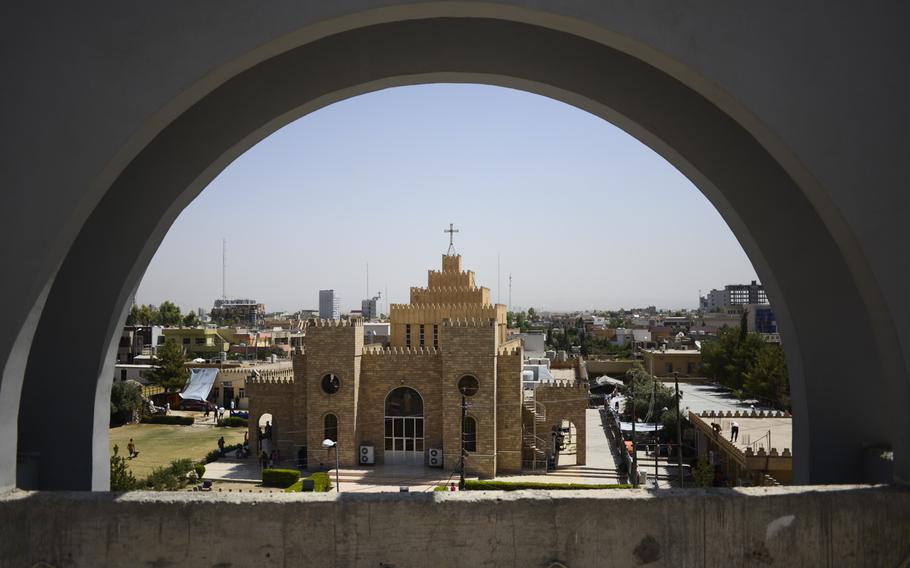 Iraqi Christians find shelter in a sweltering building next to a church in Irbil, Iraq, Aug. 21, 2014. The Christians fled their homes in fear of the Islamic State's advance in the Mosul region.