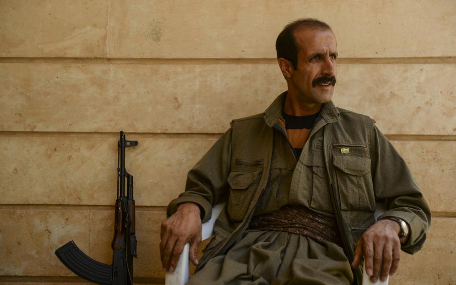 Tekosher Zagros,the Kurdistan Workers' Party or PKK commander in Makhmur,  Iraq, talks about joining forces with the peshmerga to fight the Islamic State in northern Iraq.