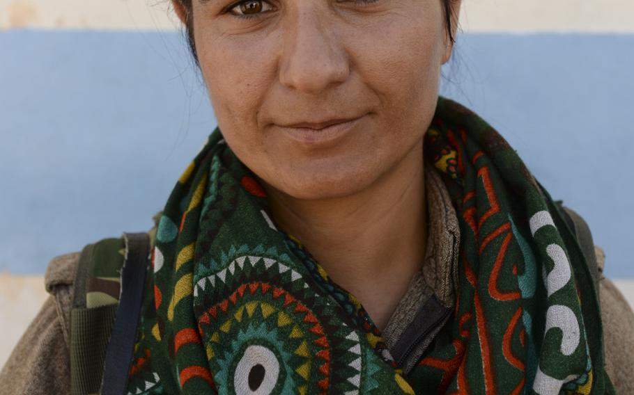 Felice Budak, 24, a female Kurdistan Workers' Party guerrilla from Turkey says that she is treated as an equal by her male counterparts. The PKK troops are fighting alongside the peshmerga in Makhmur, Iraq.