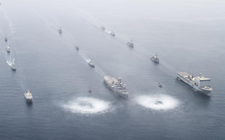 Ships from various countries participating in the international mine countermeasures exercise in the Persian Gulf sail in close formation for a photo opportunity, May 21, 2013. U.S 5th Fleet plans to host a similar large-scale exercise in October, aimed at enhancing the capability to preserve freedom of navigation in international waterways.