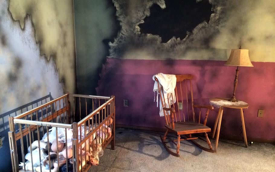 A child's bedroom is one of the settings in a haunted house at Wisconsin Scaryland. The attraction has been criticized by an area resident and town planning board member for its references to a veterans hospital in the scary building backstory on its webpage.