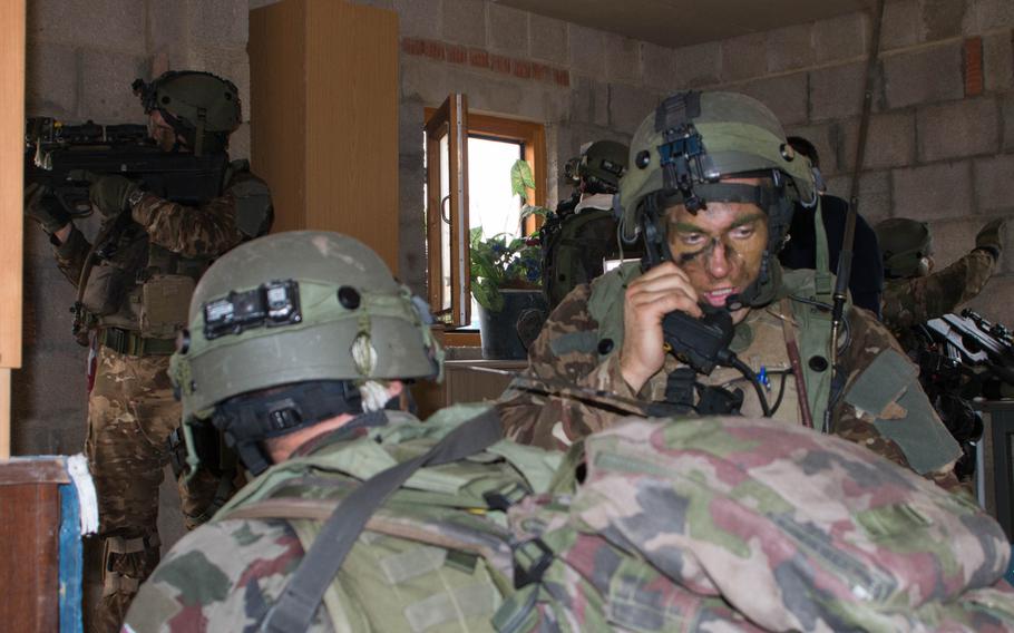 Troops from the Czech Republic and Slovenia converged on a house during the final minutes of a combat training exercise as part of Steadfast Javelin II, a NATO Allied Land Command-led multinational training exercise partly held in  Hohenfels, Germany, Sept. 8, 2014.

Michael S. Darnell/Stars and Stripes