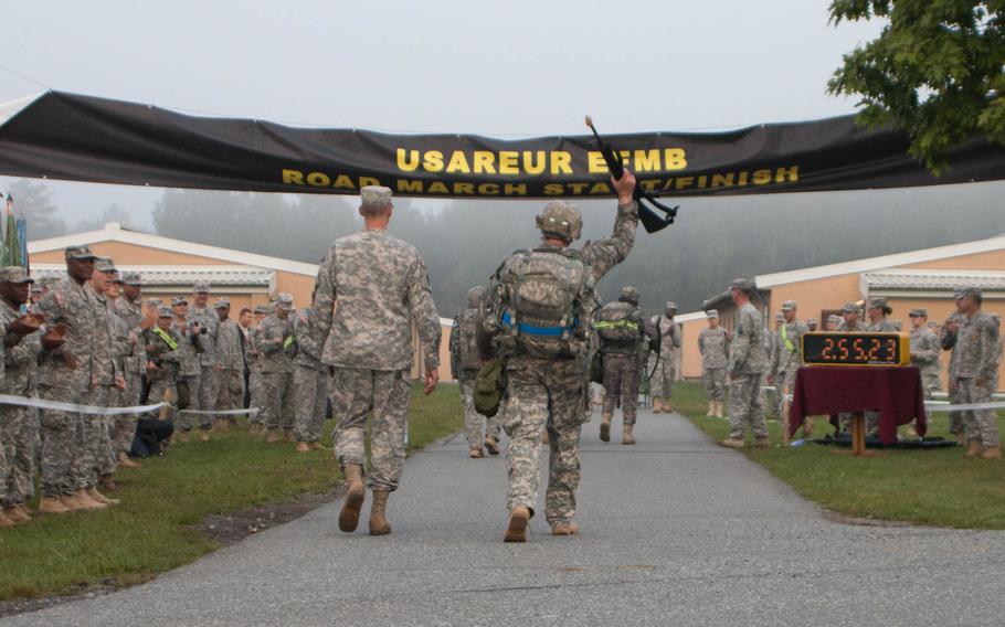 The culminating event of the Expert Field Medical Badge evaluation process was a 12-mile, full-gear hike. Here, a U.S. Army soldier crosses the finish line with just over four minutes to spare, Sept. 9, 2014, at Grafenwoehr, Germany.