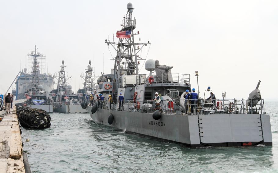 The USS Monsoon moves to a different spot alongside the pier at Naval Support Activity Bahrain, Aug 28, 2014. The Monsoon and the USS Hurricane are undergoing a reactivation process at their new homeport in Bahrain.