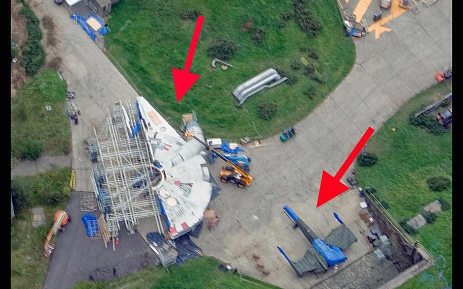 A photo taken over Greenham Common on Friday, Sept. 5, 2014, shows what seems to be a model of the Millennium Falcon and an X-Wing, prominent spacecraft in the original "Star Wars" movie trilogy.