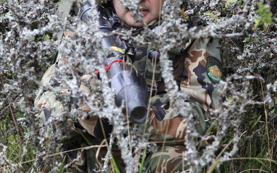 A Bulgarian soldier of 4th Company, 3rd Mechanized Battalion, 61st Mechanized Brigade provides security during training exercise Saber Junction 2014 at the Joint Multinational Readiness Center in Hohenfels, Germany, Sept. 3, 2014.