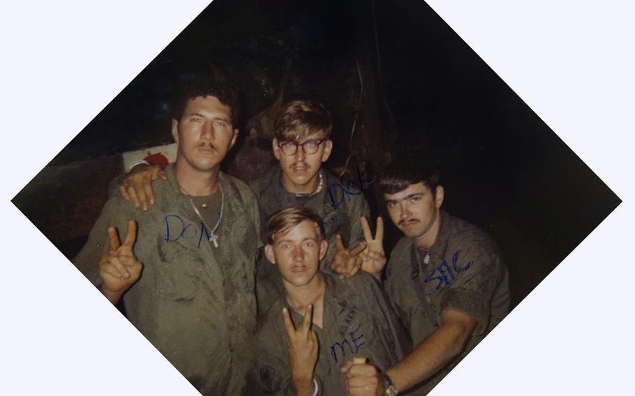 Donald P. Sloat with members from his unit in Vietnam.