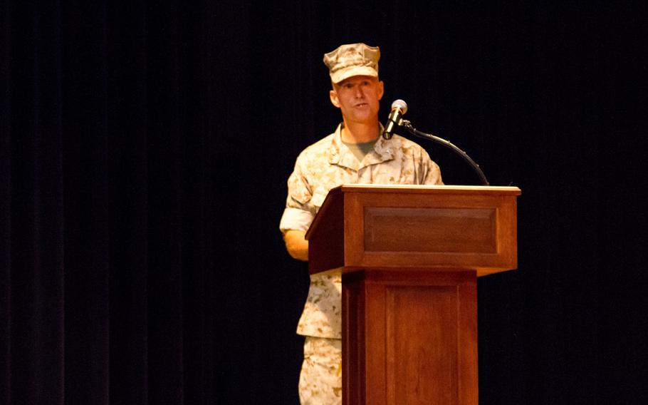 Marine Brig. Gen. Carl Mundy III delivers remarks on Sunday, Sept. 14, 2014, after assuming command of Commander, Task Force 51, which oversees the amphibious forces operating in the U.S. 5th Fleet area of responsibility.